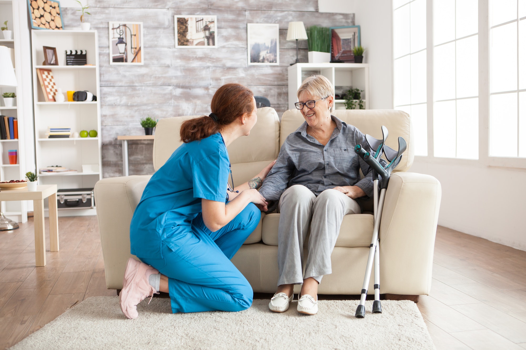 female-nurse-talking-with-an-old-woman.jpg
